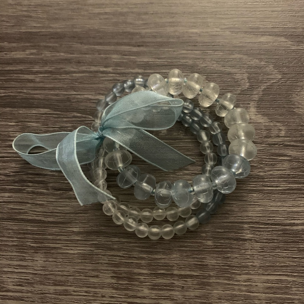 Teal beaded bracelets with bow